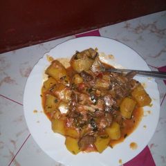 A picture of Matoke stew with beef.