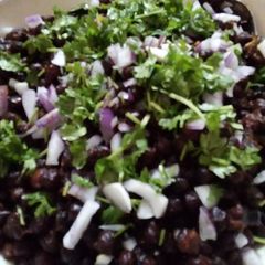 A picture of Fried Black chana chaat with green masala.