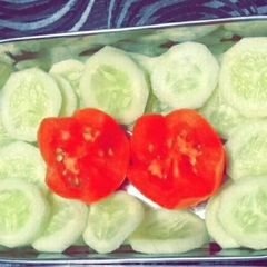 A picture of Cucumber tomato salad.