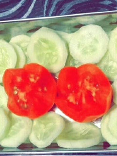 A picture of Cucumber tomato salad.