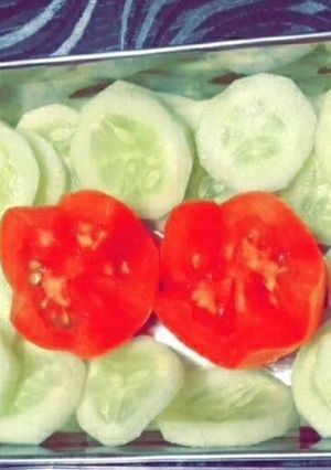A picture of Cucumber tomato salad.