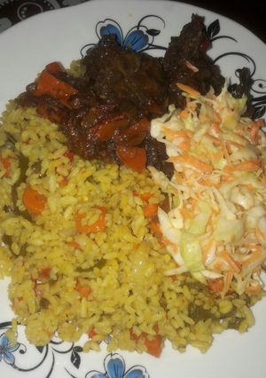 A picture of Fride rice with peppered chiken.