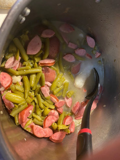A picture of Beans Potatoes and Sausage.