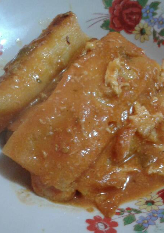 Una foto de Canelones con queso y pollo
