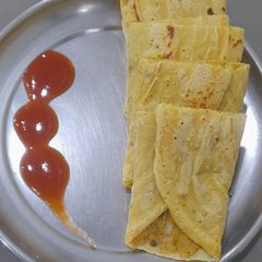 A picture of Besan Chilla with Potato Masala Filling.