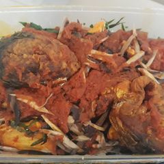 A picture of Roasted yam with ugba and fish.