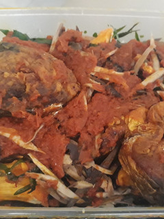 A picture of Roasted yam with ugba and fish.