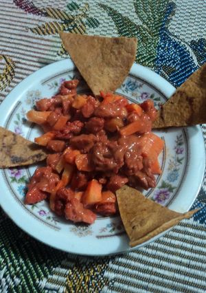 Una foto de Ensalada de soya texturizada, zanahoria cruda, cebolla y bbq