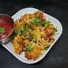 A picture of Crispy granted potato pakoda.
