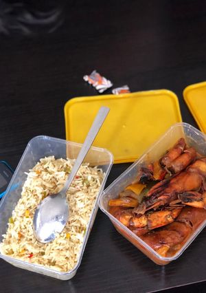 A picture of Rice and shrimp sauce.