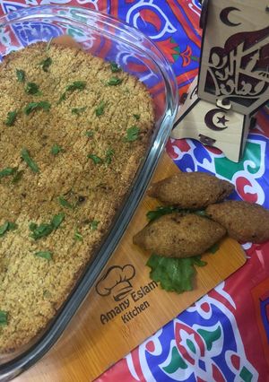 A picture of Fried Kibbeh, Baked Kibbeh (Kibbeh bil Sanieh), or Kibbeh Balls.