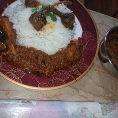 A picture of Alu began with white zeera rice.