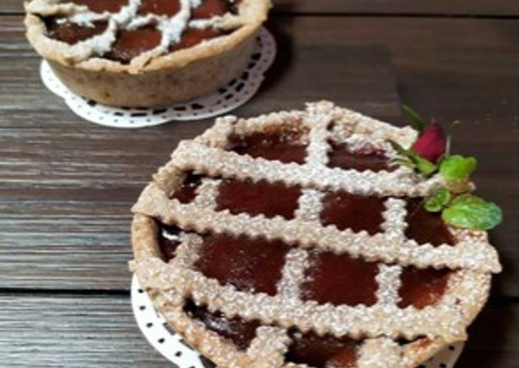 Crostatine,con farina di riso,nero e confettura di prugne