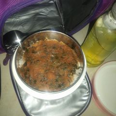 A picture of White Rice and Beans with vegetable stew.