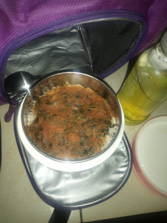 A picture of White Rice and Beans with vegetable stew.