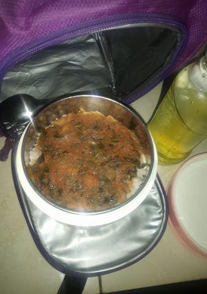 A picture of White Rice and Beans with vegetable stew.