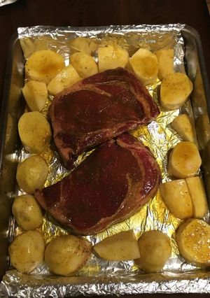 A picture of Beef stake with potatoes.