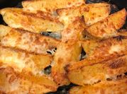 A picture of cheesy wedges