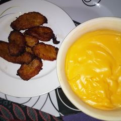 A picture of Fried Plantain with Banana Flavored Custard.