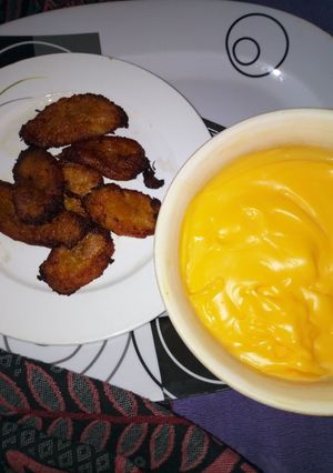 A picture of Fried Plantain with Banana Flavored Custard.
