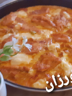 صورة لوصفة صينية البطاطا وشرائح الاسكالوب محمرة