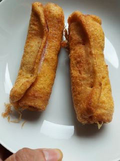 Una foto de Rollito de pan bimbo con jamón york y queso