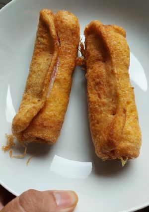 Una foto de Rollito de pan Bimbo con jamón york y queso