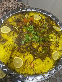 صورة لوصفة عشاء رز مدفون باللحم