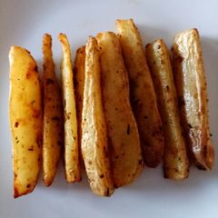 A picture of Sweet and spicy potato wedges.