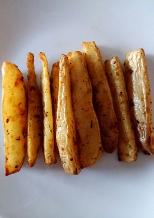 A picture of Sweet and spicy potato wedges.