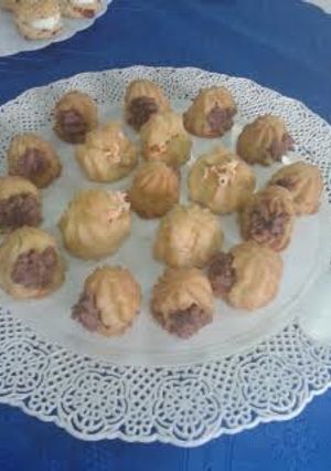 Una foto de Profiteroles salados