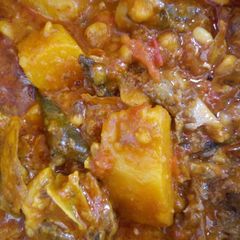 A picture of Yam and beans porridge with dry fish.