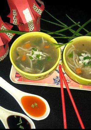 A picture of Chicken veggies noodles soup.