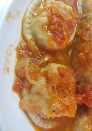 Una foto de Sorrentinos de pollo y jamón cocido
