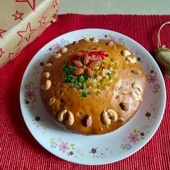 A picture of Plum cake -loaded with dry fruits (soaked in red grapes juice).