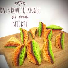 รูปของ Rainbow triangel cake ala mommy Nickie🌻🌹