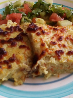 Una foto de Budín de coliflor y pollo al estilo Mari