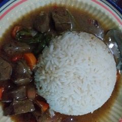 White rice with kidney sauce A picture of White rice with kidney sauce.