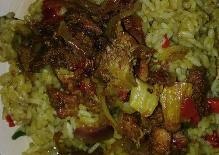 Curry jallof rice with meat pepper