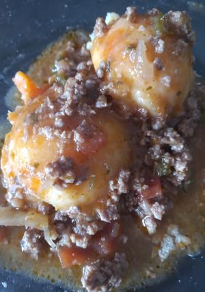 Una foto de Bochitas de puré con salsa portuguesa 👐