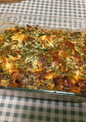 Une photo de Gratin de fenouil aux champignons, tomates, mozzarella et crème de parmesan