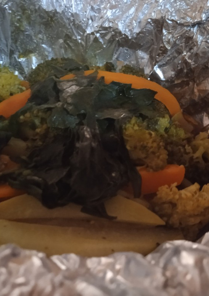 Una foto de Filete de pescado a vapor con verduras