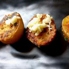 A picture of Crispy cheese potato (baby potato with cornflour).