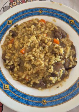 Una foto de Asaduras de pollo con arroz