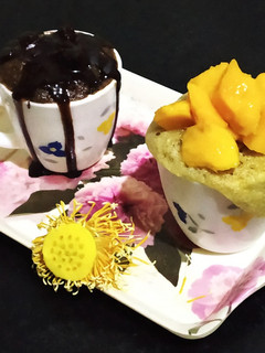 A picture of Cocoa chocolate cup cake & Mango cup cake.