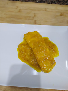 Una foto de Salmón en salsa de naranja