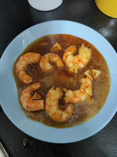 Una foto de Langostinos a la miel y limón