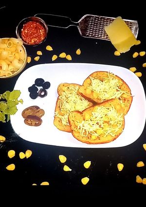 A picture of Cheese corn garlic bread.