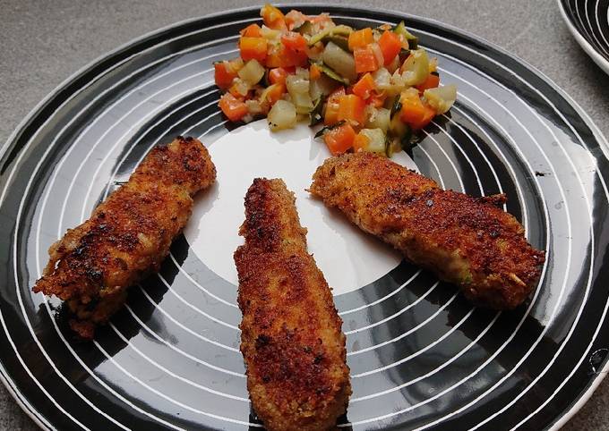 Panierte Pestohähnchenspieße mit Buttergemüse