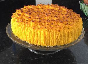 Una foto de Torta de coco y dulce de leche